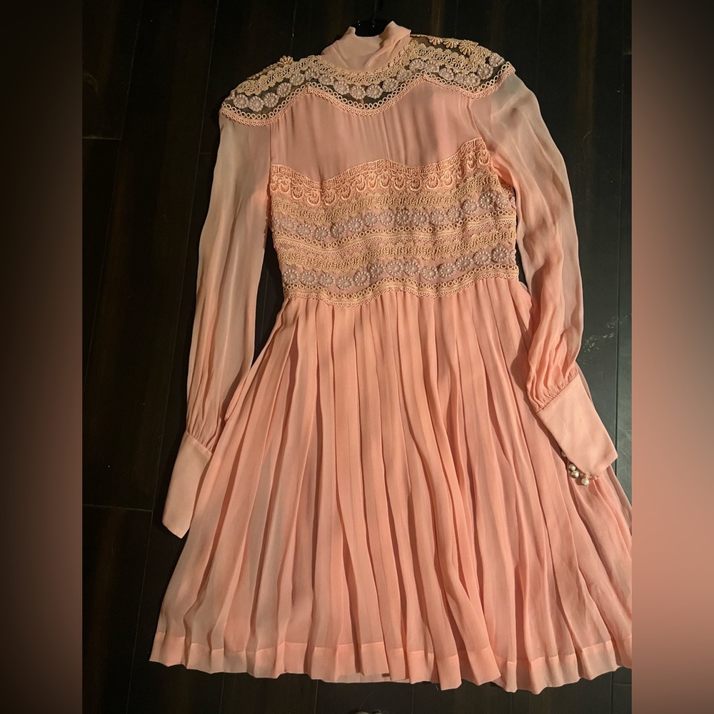 Gucci Long sleeved short dress. Never worn. Tags still on.